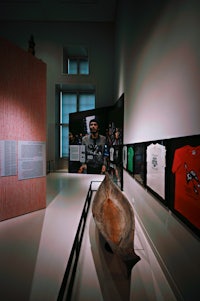 a wooden boat on display in a museum