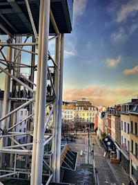 a clock tower in the middle of a city