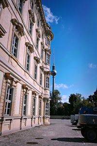 a building with a tv tower in the background