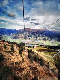 a cable car going up a mountain