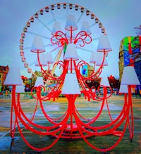 a ferris wheel in the background