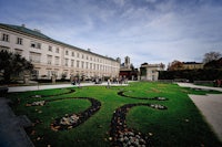 a large green lawn in front of a building