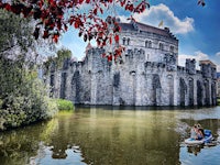 a castle in the middle of a body of water