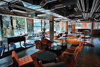 a room with tables and chairs